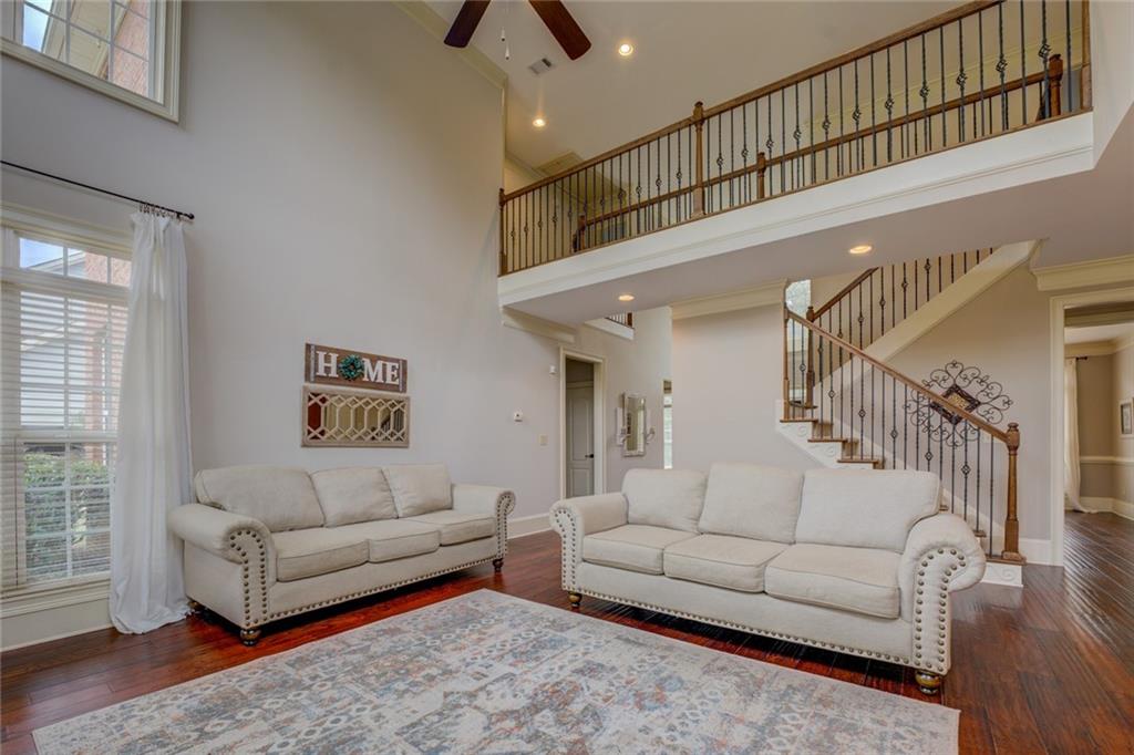 150 Alcovy Reserve Way Covington, GA 30014 - Photo 29 of 70 a living room with furniture and a ceiling fan