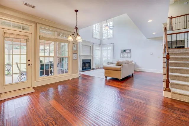 a view of livingroom with furniture and ceiling fan