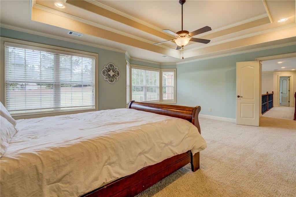 150 Alcovy Reserve Way Covington, GA 30014 - Photo 47 of 70 a bedroom with a bed and window