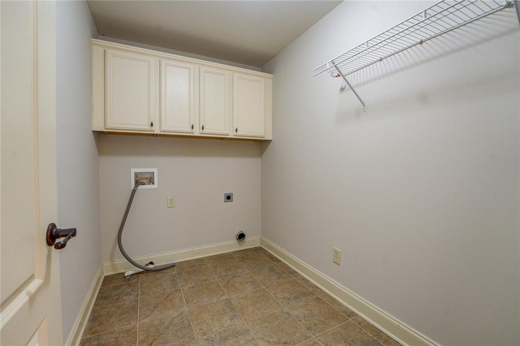 150 Alcovy Reserve Way Covington, GA 30014 - Photo 55 of 70 a view of a room with racks on the wall