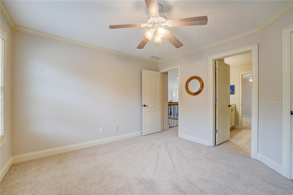150 Alcovy Reserve Way Covington, GA 30014 - Photo 62 of 70 an empty room with closet and windows