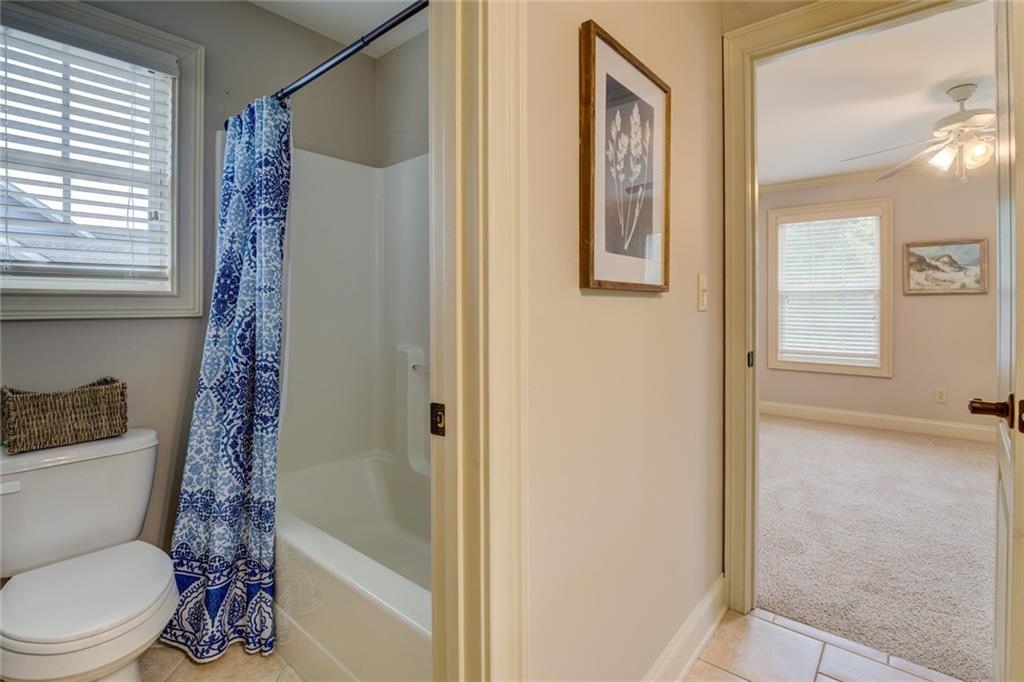 150 Alcovy Reserve Way Covington, GA 30014 - Photo 64 of 70 a bathroom with a toilet and shower