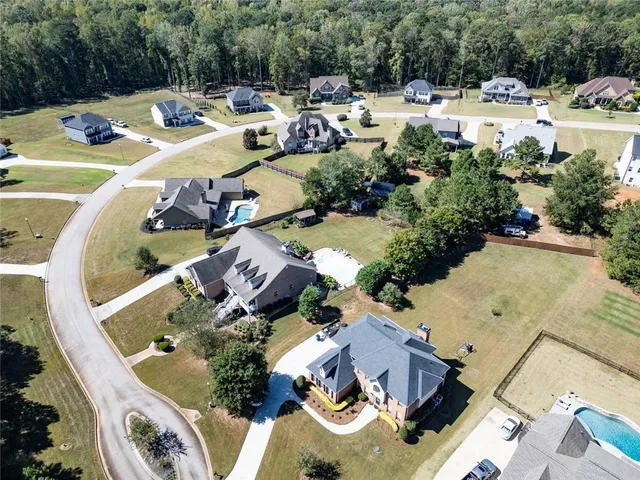 an entryway with wooden floor and stairs