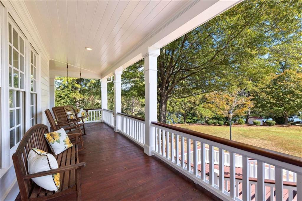 5225 Chalybeate Springs Road Woodland, GA 31836 - Photo 14 of 100 a view of a chairs and tables in the balcony