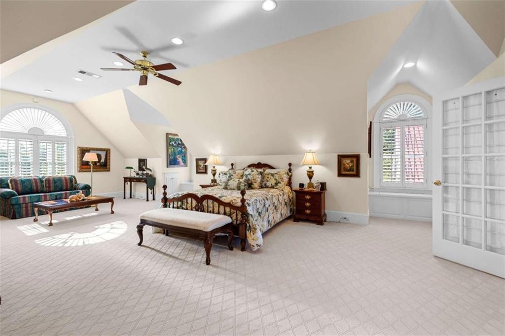 5225 Chalybeate Springs Road Woodland, GA 31836 - Photo 71 of 100 a spacious bedroom with furniture and a large window