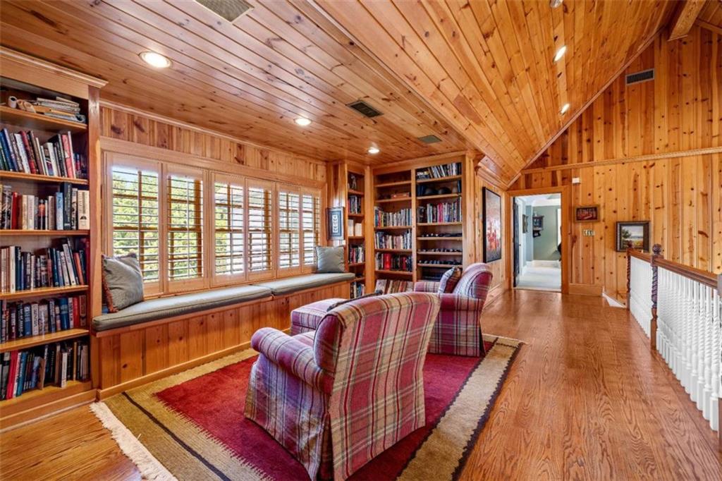 5225 Chalybeate Springs Road Woodland, GA 31836 - Photo 87 of 100 a living room with furniture and a book shelf