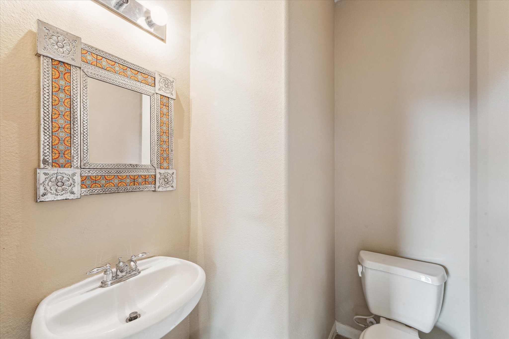 4713 Cypress Bend Court Pearland, TX 77584 - Photo 16 of 27 Half bath off family room