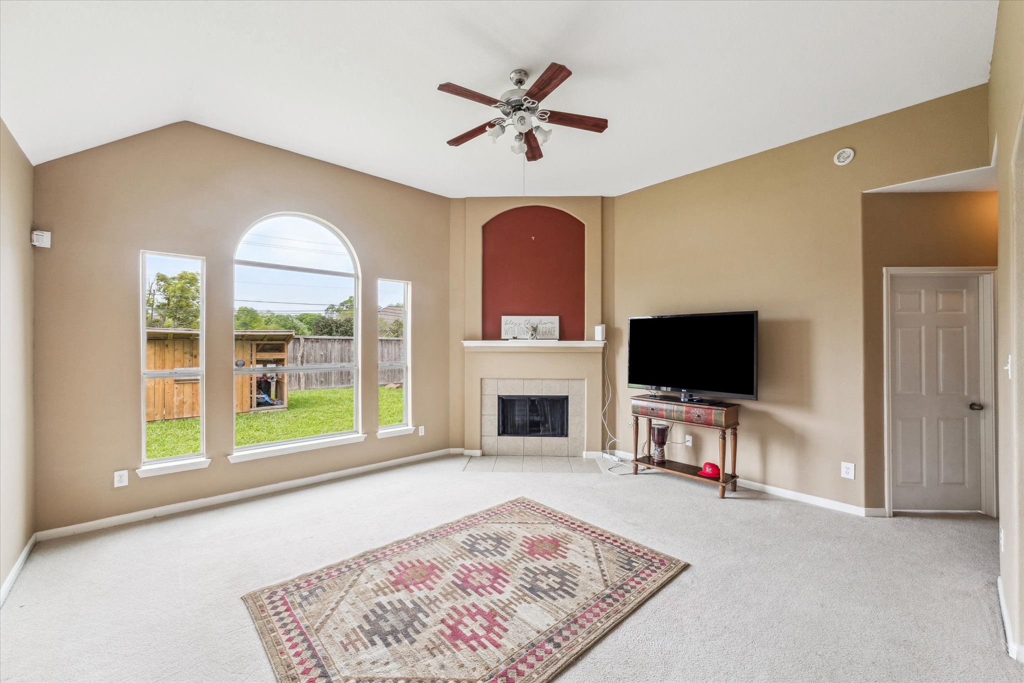 4713 Cypress Bend Court Pearland, TX 77584 - Photo 8 of 27 Family room with gas log fireplace