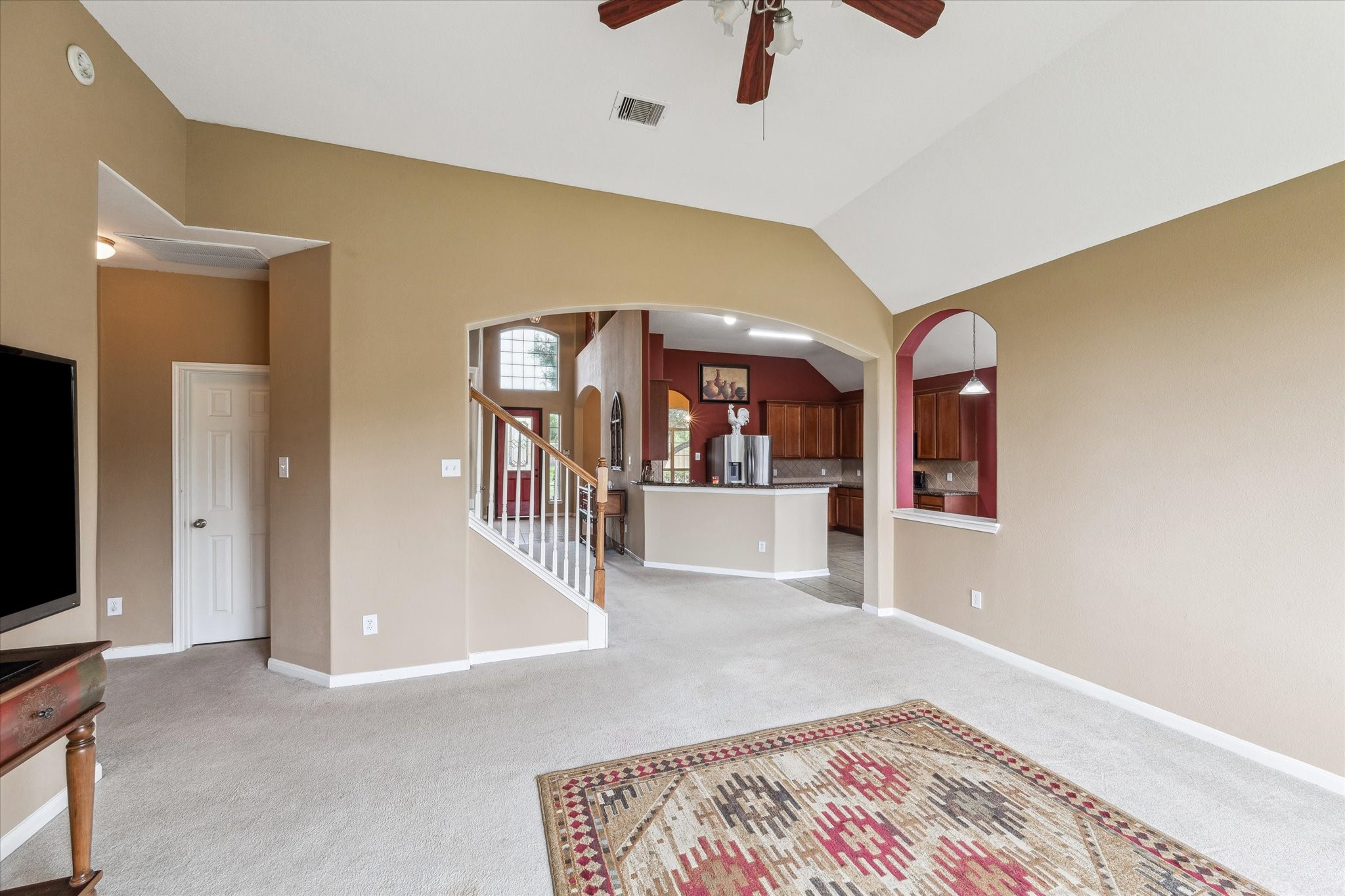4713 Cypress Bend Court Pearland, TX 77584 - Photo 10 of 27 View from family room to entry and kitchen area