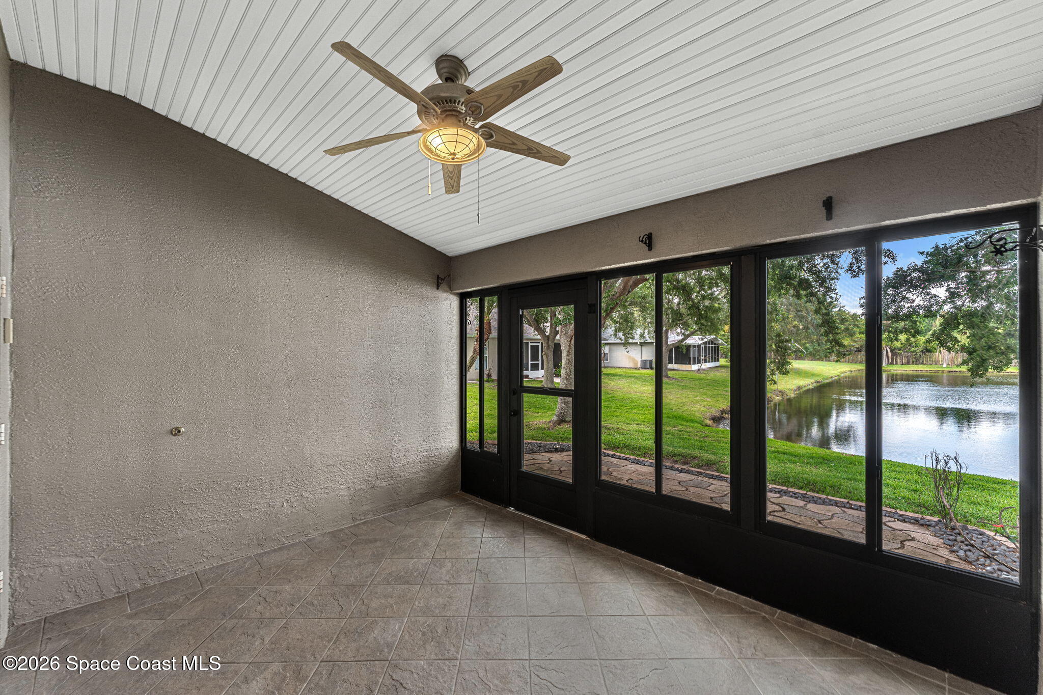 4741 Decatur Circle Melbourne, FL 32934 - Photo 25 of 45 Enclosed Florida Room
