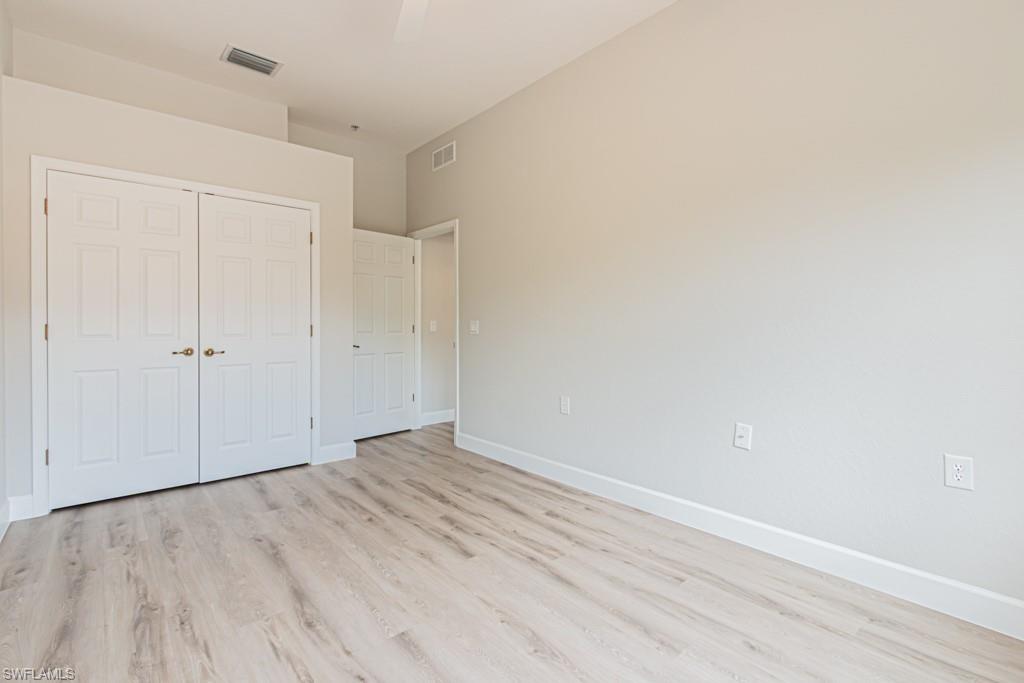 26448 Lucky Stone Road, Unit 202 Bonita Springs, FL 34135 - Photo 38 of 50 a view of an empty room