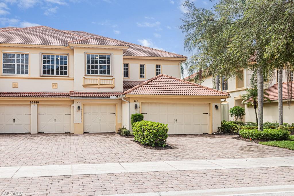 26448 Lucky Stone Road, Unit 202 Bonita Springs, FL 34135 - Photo 49 of 50 2 car garage(on the end)