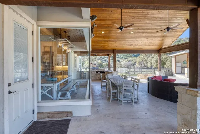 a view of a dining room with furniture window and outside view