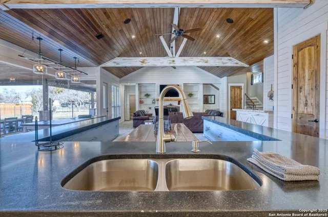 a view of a swimming pool with a outdoor seating