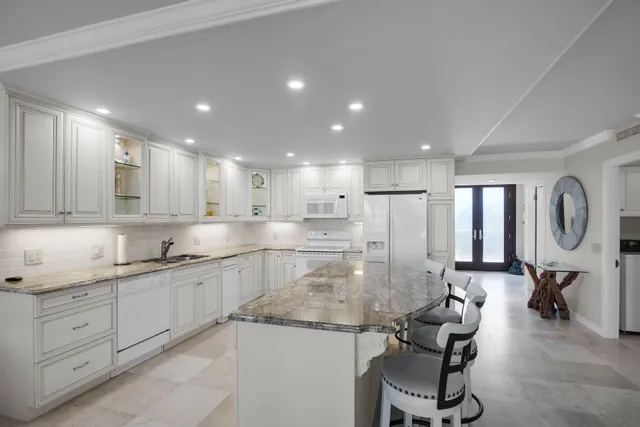 a bedroom with a bed and dresser