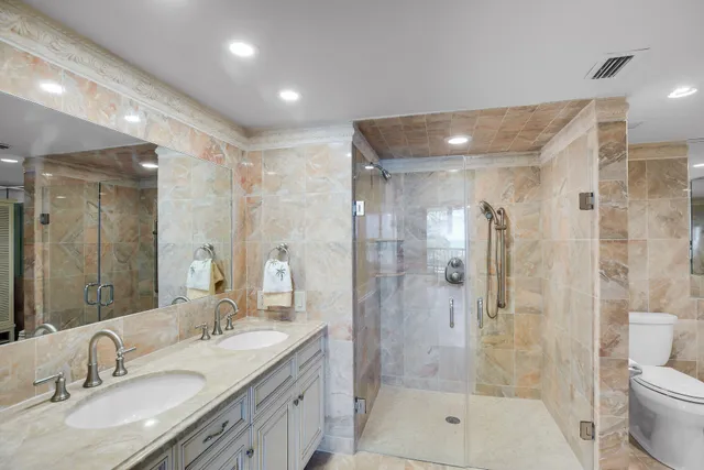 a bedroom with a bed and a table in it