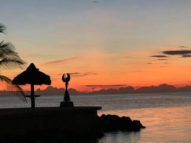 a view of a balcony with chairs