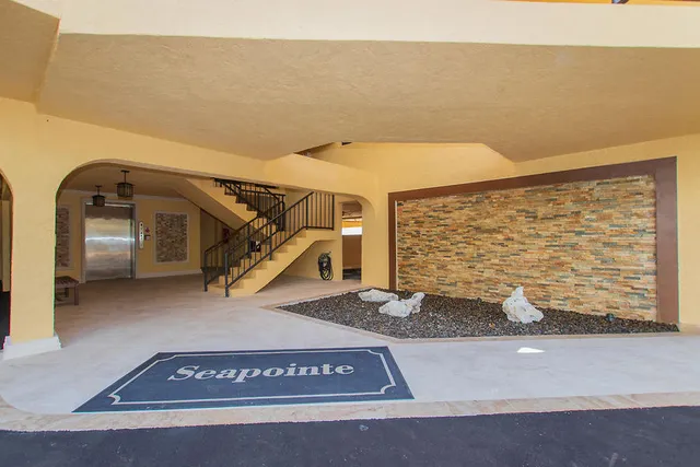 a view of a brick building from a balcony