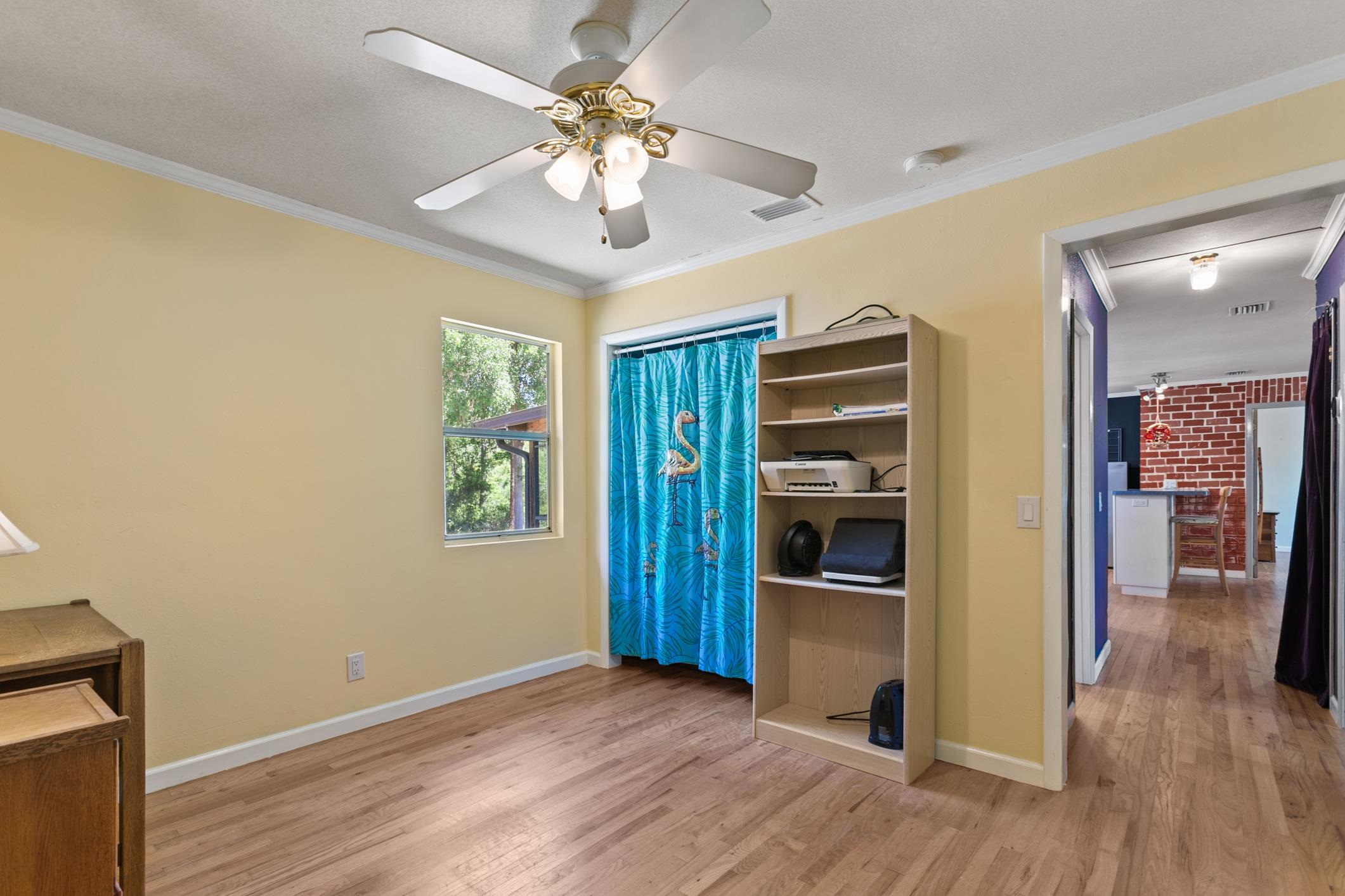958-954 Grand Rondo Crescent City, FL 32112 - Photo 18 of 23 wooden floor in an empty room with a window