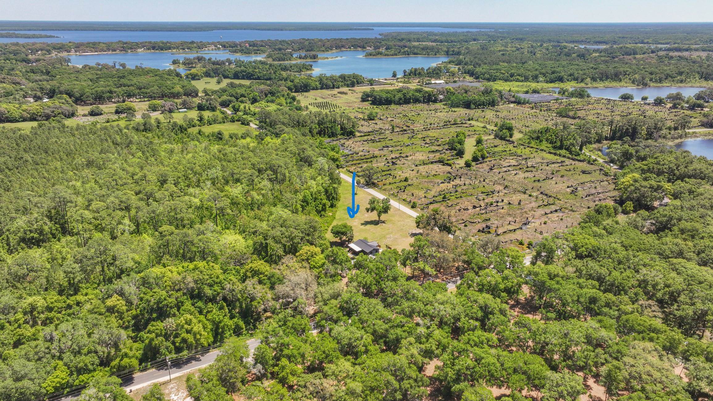 958-954 Grand Rondo Crescent City, FL 32112 - Photo 3 of 23 an aerial view of a houses with yard