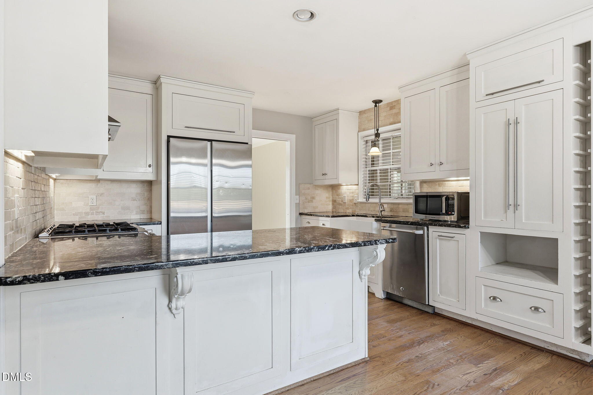 1130 Prospect Church Road Dunn, NC 28334 - Photo 15 of 47 a kitchen with granite countertop white cabinets and white appliances