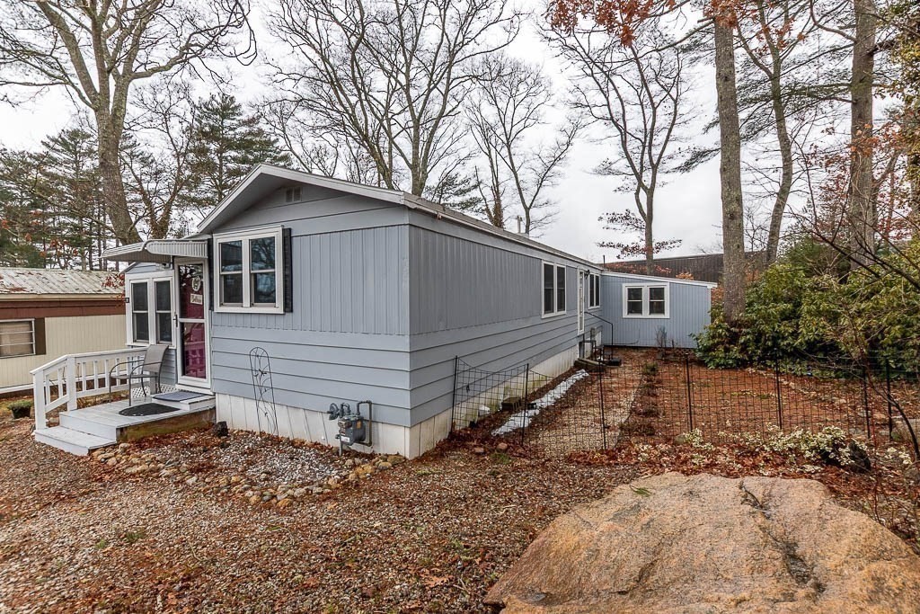 5 Timber Lane Wareham, MA 02571 - Photo 5 of 31 a view of a house with a yard