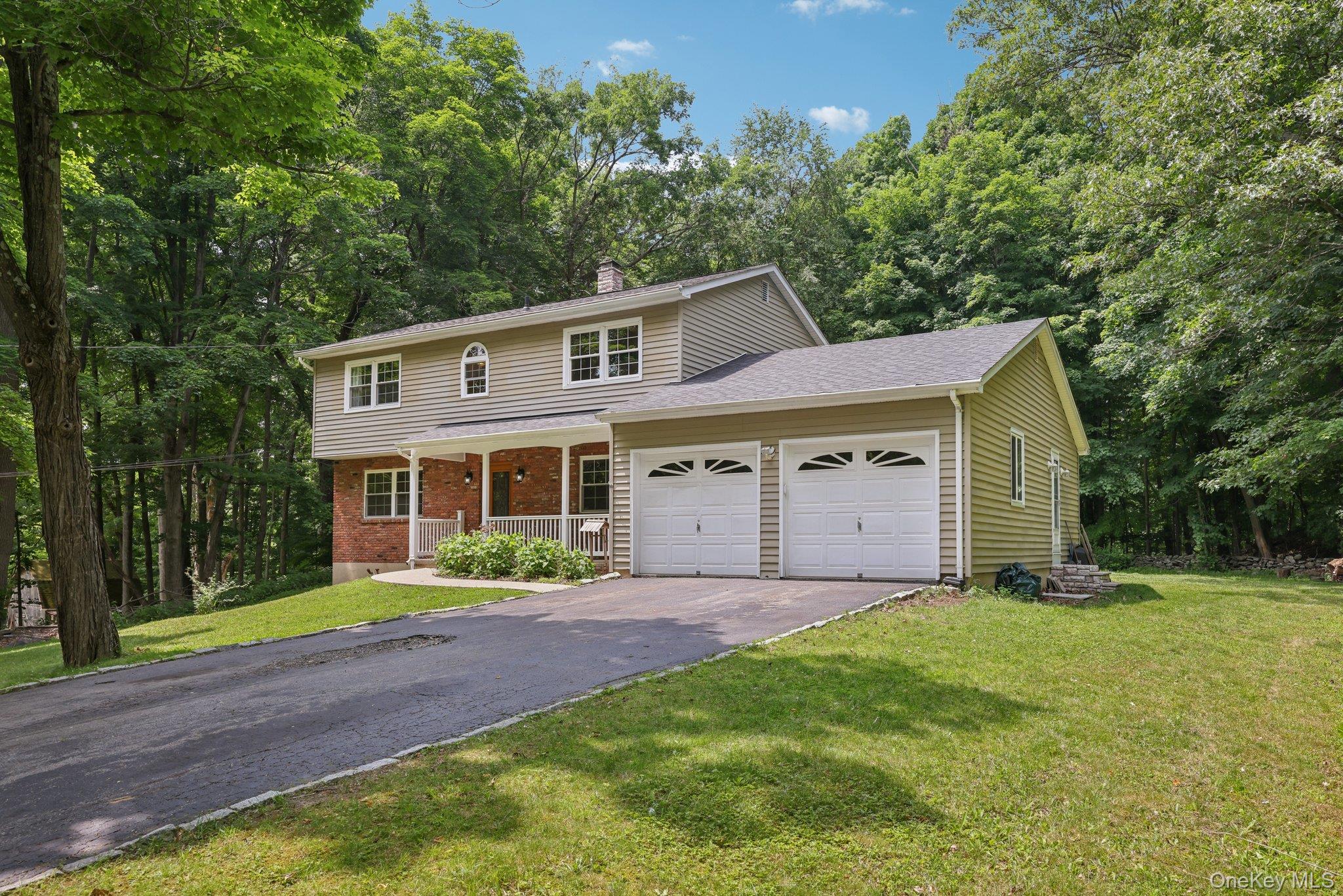 78 Pickerel Road Monroe, NY 10950 - Photo 2 of 37 a front view of house with yard and green space