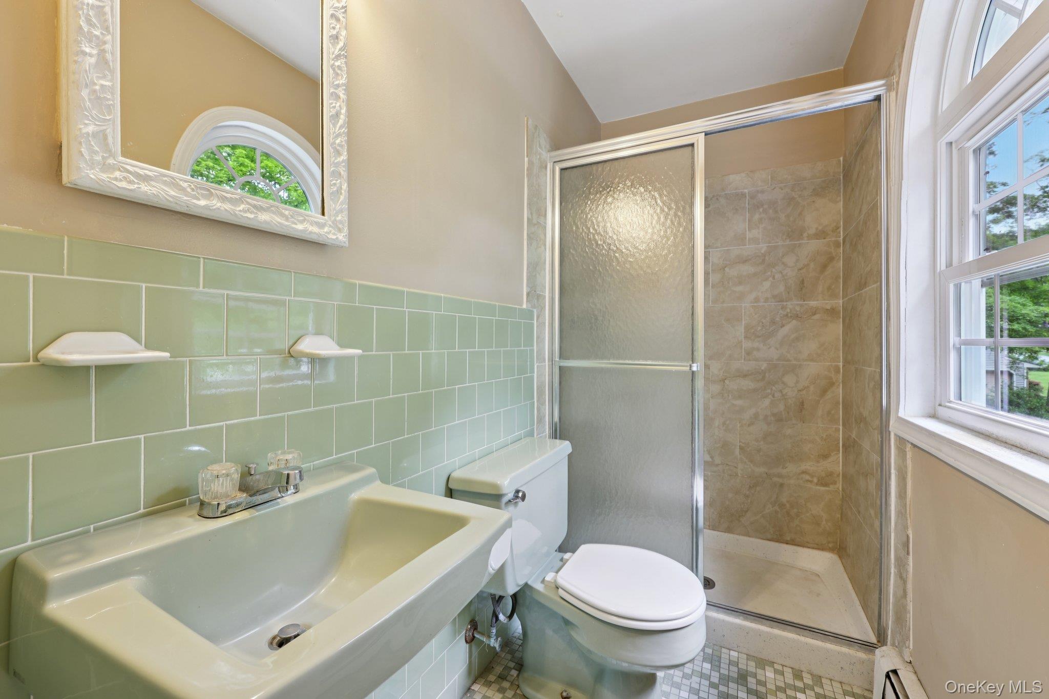 78 Pickerel Road Monroe, NY 10950 - Photo 26 of 37 a bathroom with a sink and a mirror