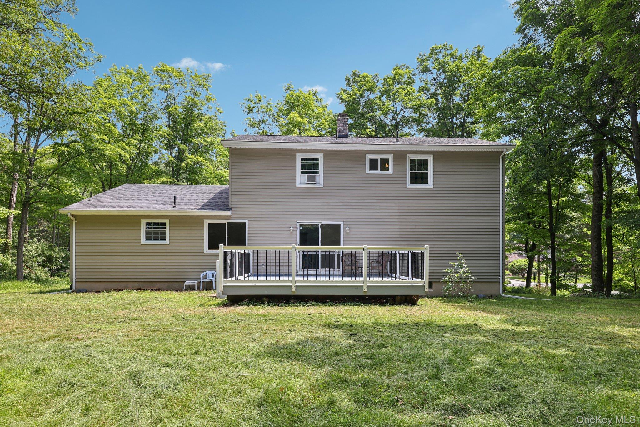 78 Pickerel Road Monroe, NY 10950 - Photo 32 of 37 a front view of a house with a garden