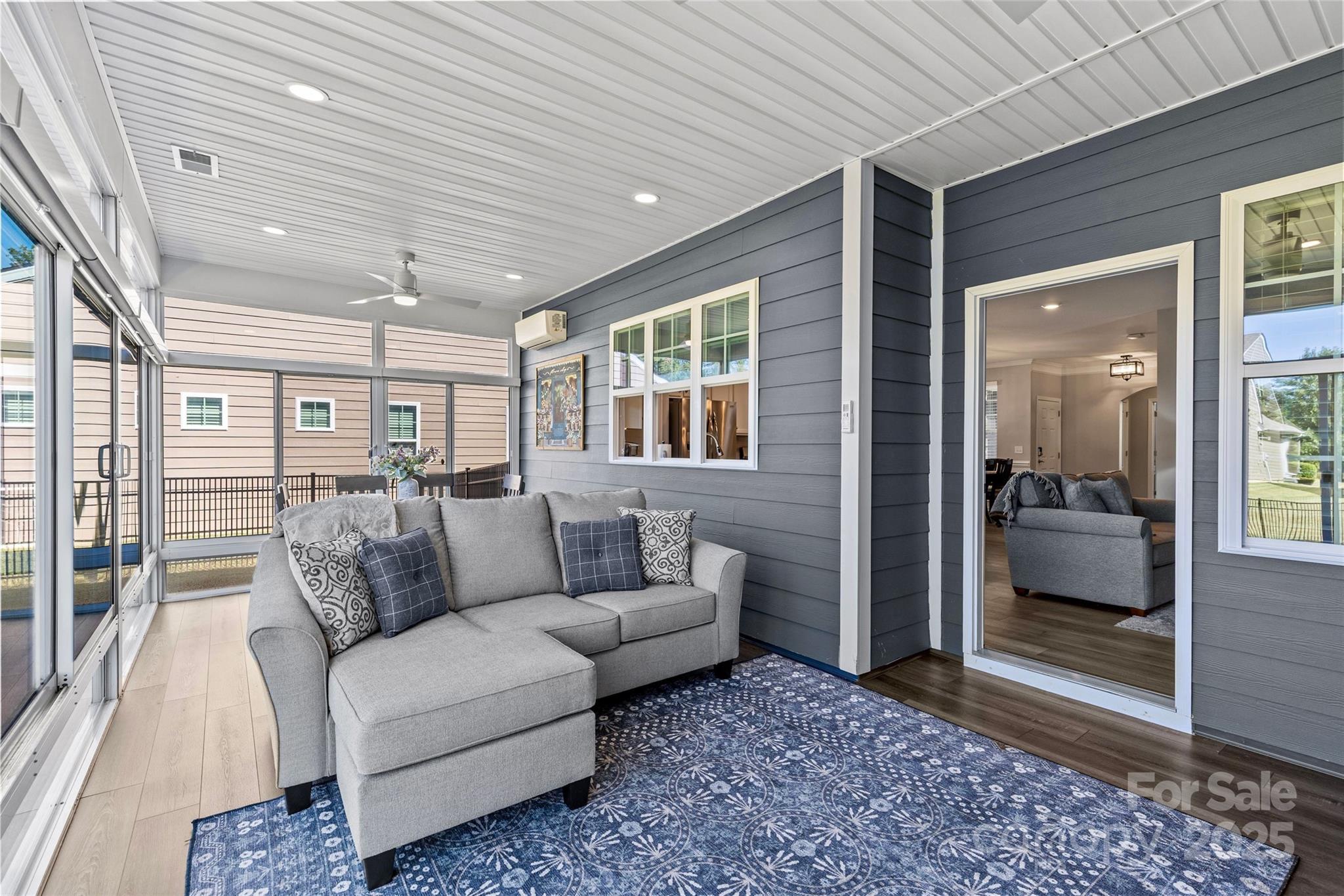 5049 Redwood Grv Trail Lancaster, SC 29720 - Photo 23 of 43 a living room with furniture and a gate
