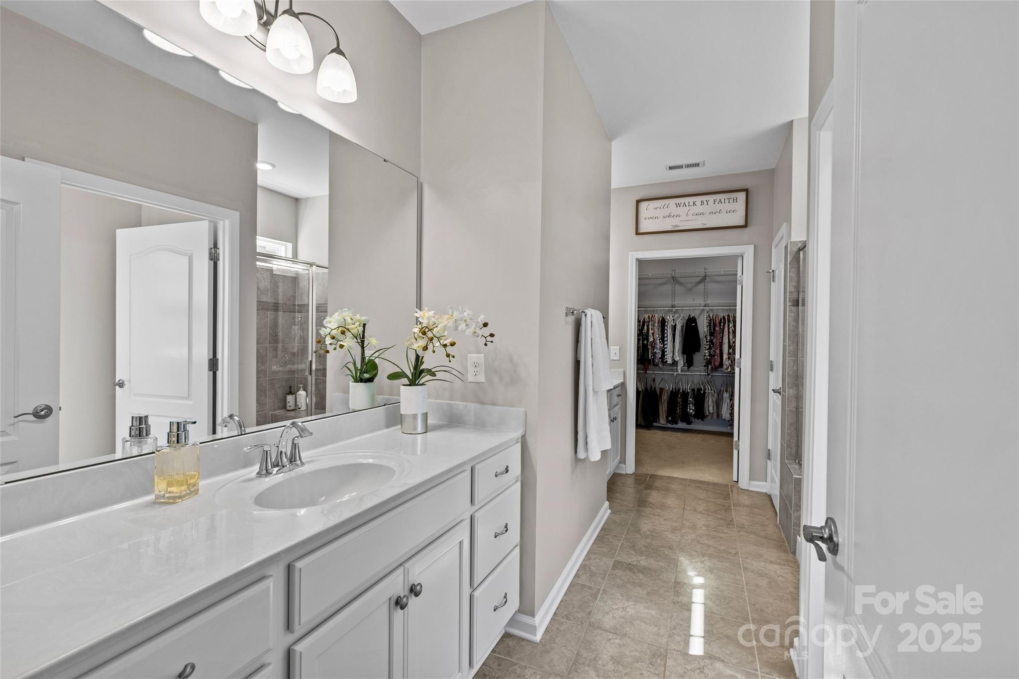 5049 Redwood Grv Trail Lancaster, SC 29720 - Photo 27 of 43 a spacious en suite bathroom with a sink and a mirror
