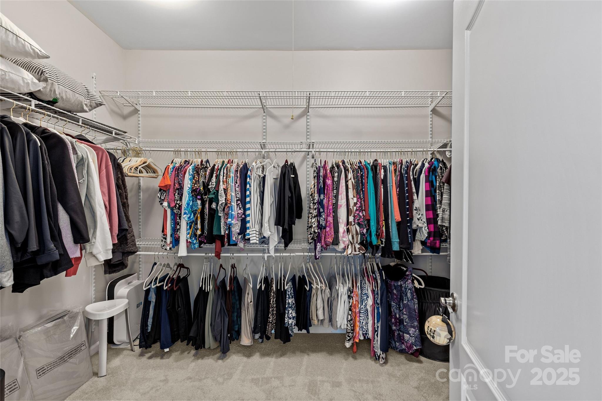 5049 Redwood Grv Trail Lancaster, SC 29720 - Photo 29 of 43 a view of walk in closet with clothes