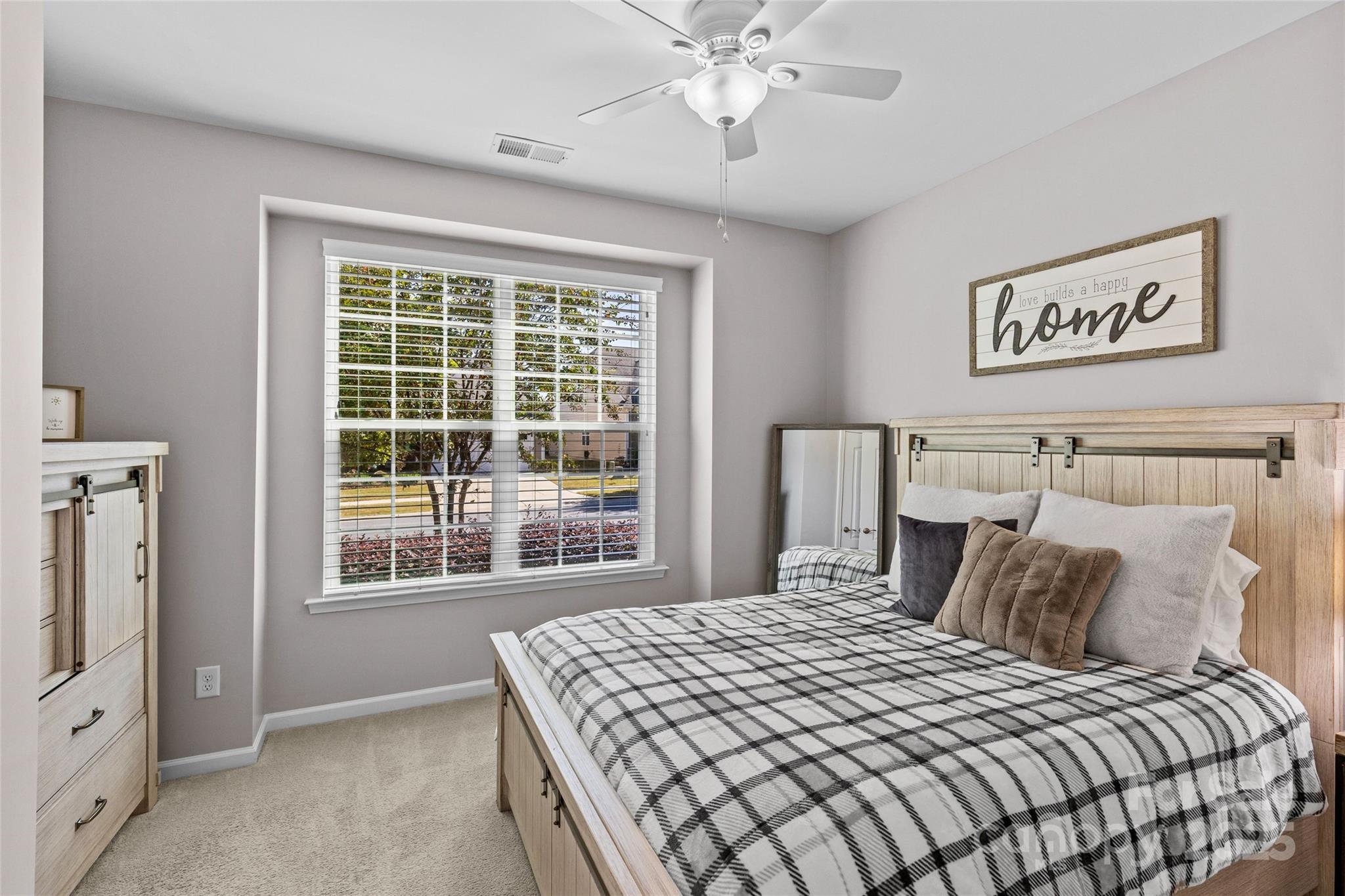 5049 Redwood Grv Trail Lancaster, SC 29720 - Photo 30 of 43 a bedroom with a bed and a window