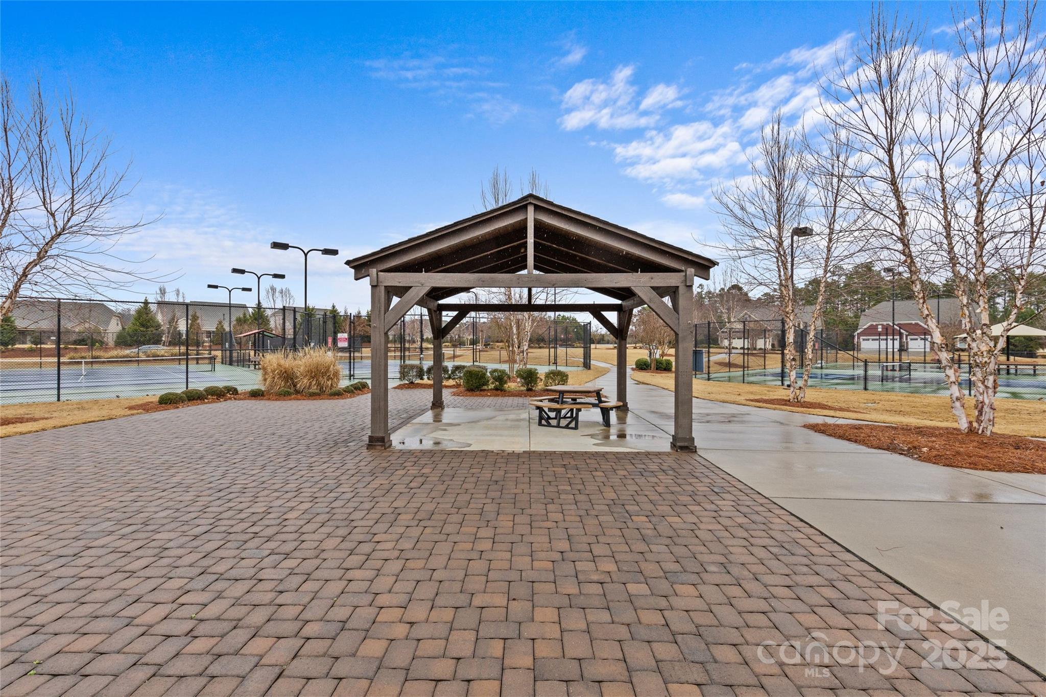 5049 Redwood Grv Trail Lancaster, SC 29720 - Photo 36 of 43 a patio with table and chairs