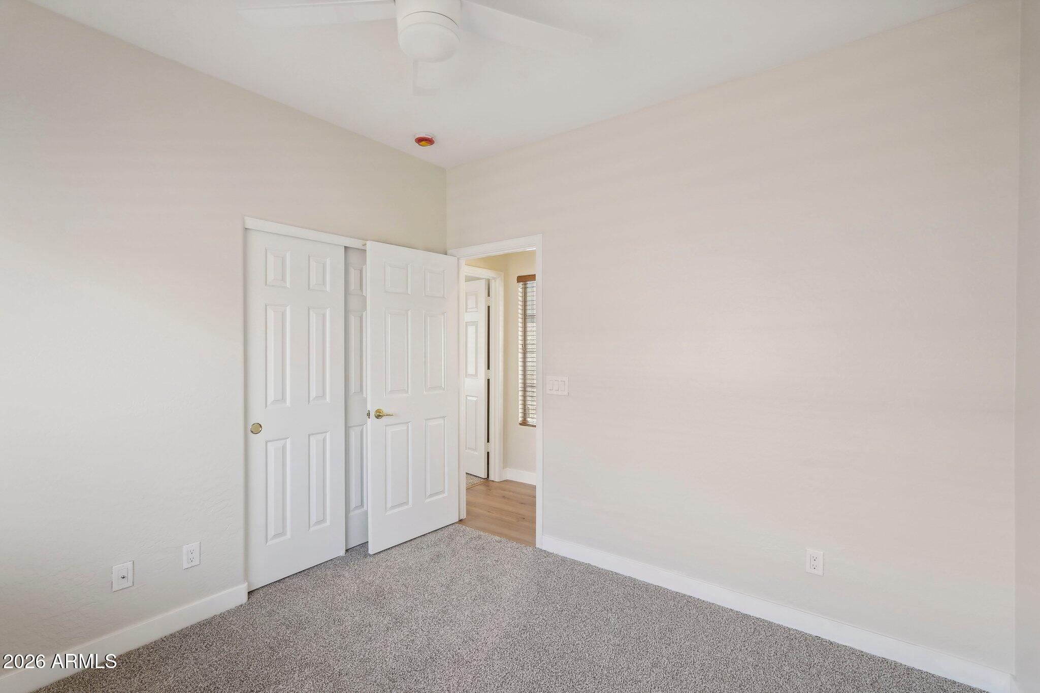 12806 West Charter Oak Road El Mirage, AZ 85335 - Photo 28 of 36 a view of an empty room