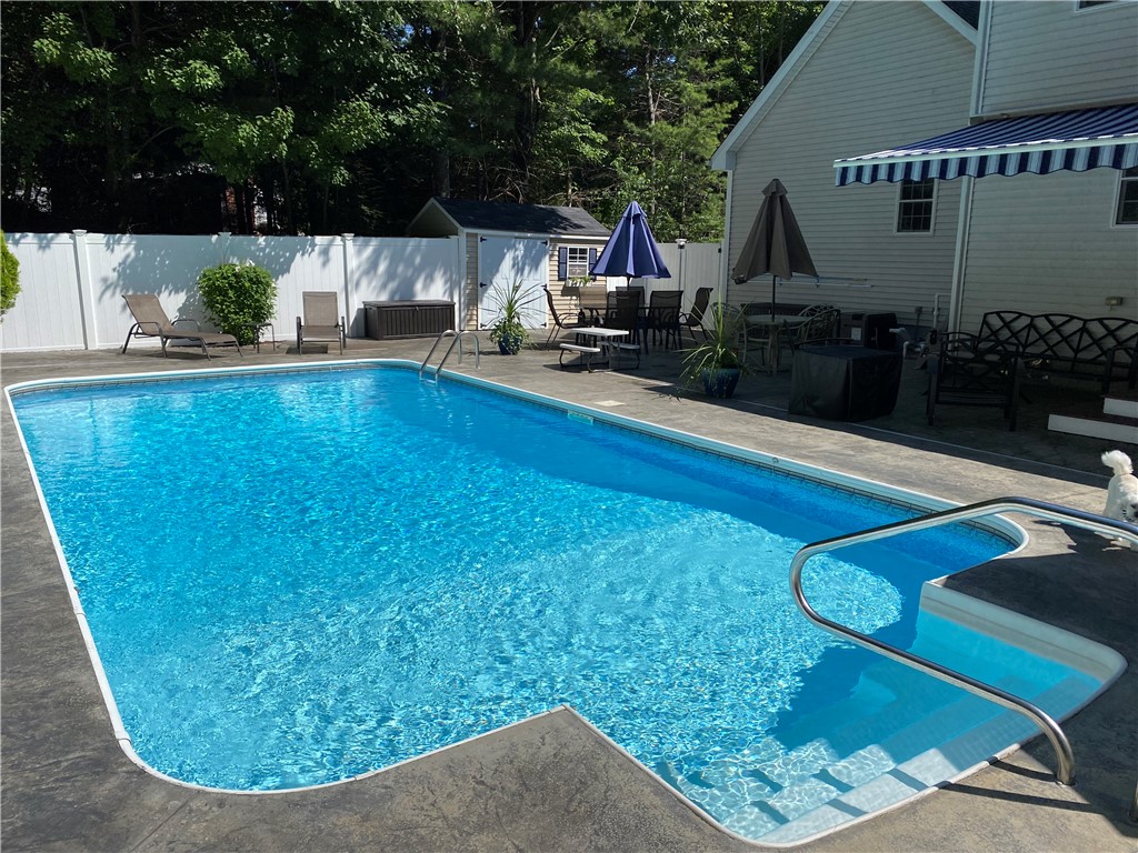 264 Round Top Road Burrillville, RI 02830 - Photo 41 of 49 pool with patio and awning