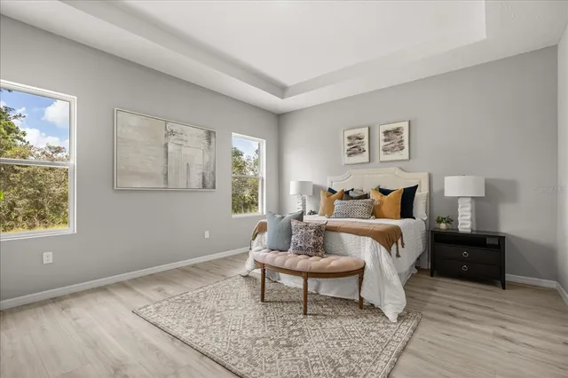 a bed room with a bed and a window