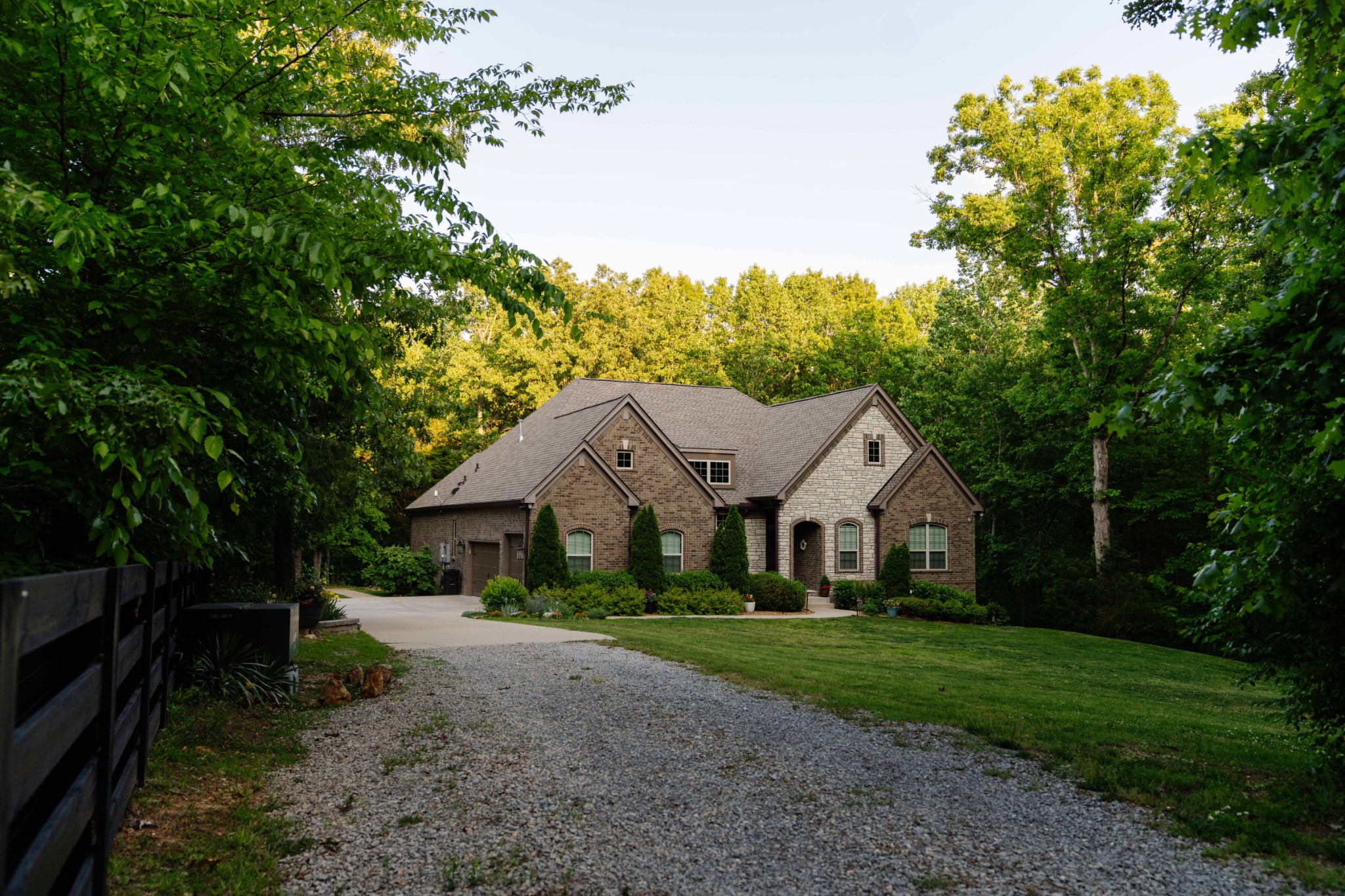 8012 Rose Rdg Lane Fairview, TN 37062 - Photo 29 of 52 a view of house with a big yard and large trees