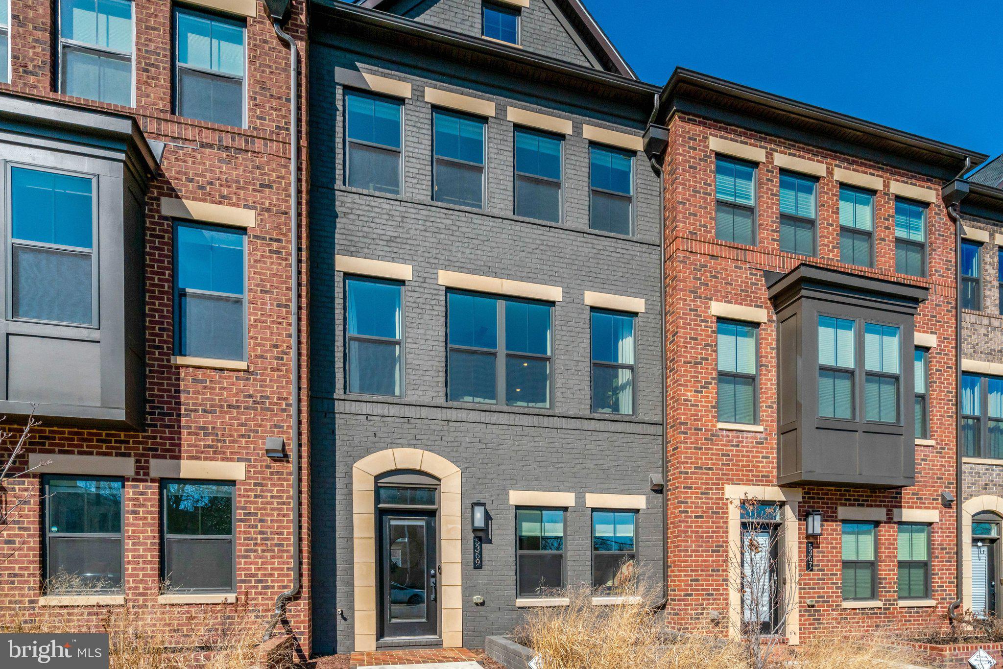 Modern townhome with stylish facade.