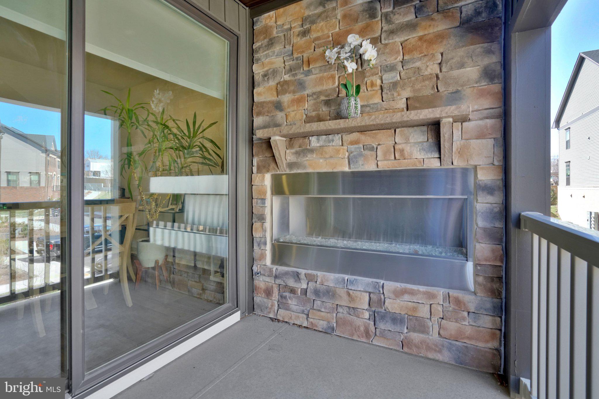 5369 8th Road South Arlington, VA 22204 - Photo 21 of 37 Stylish balcony with modern fireplace.