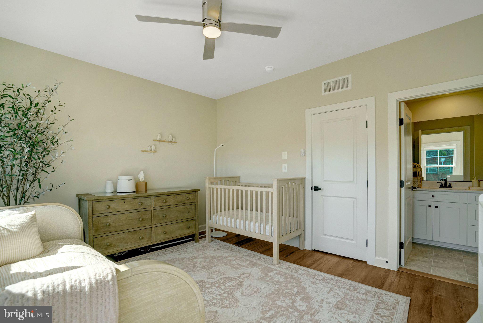 5369 8th Road South Arlington, VA 22204 - Photo 24 of 37 Serene nursery with modern touches.