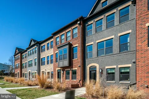 a front view of a building with garden