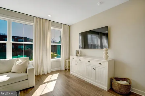 a living room with furniture and window