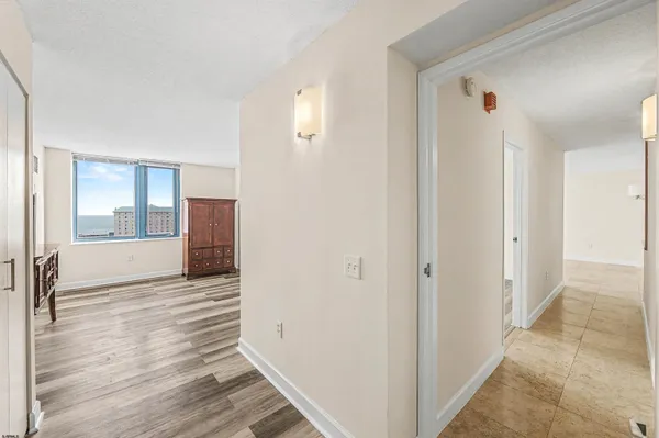 a view of an entryway with a front door