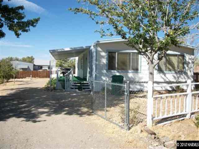 16125 Rhyolite Circle Reno, NV 89521 - Photo 1 of 8 a view of a house with a yard