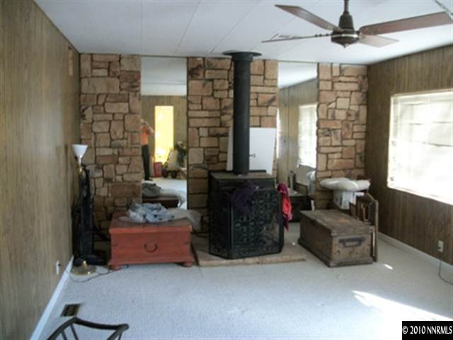 16125 Rhyolite Circle Reno, NV 89521 - Photo 4 of 8 a living room with furniture and a window