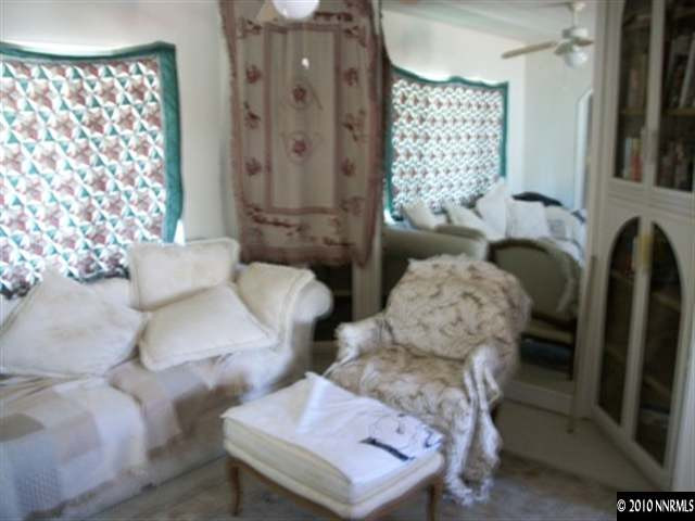 16125 Rhyolite Circle Reno, NV 89521 - Photo 5 of 8 a living room with furniture and a large window
