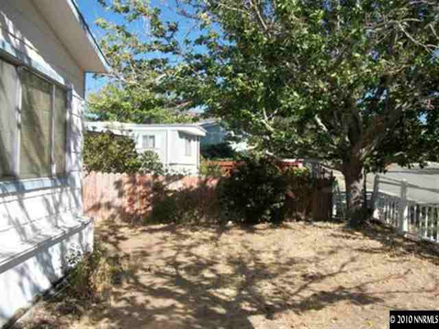 16125 Rhyolite Circle Reno, NV 89521 - Photo 7 of 8 a view of a house with a yard