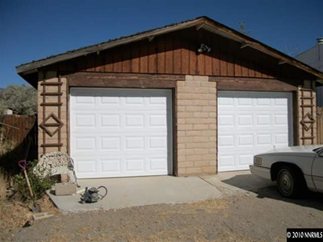 16125 Rhyolite Circle Reno, NV 89521 - Photo 8 of 8 a front view of a house with parking area