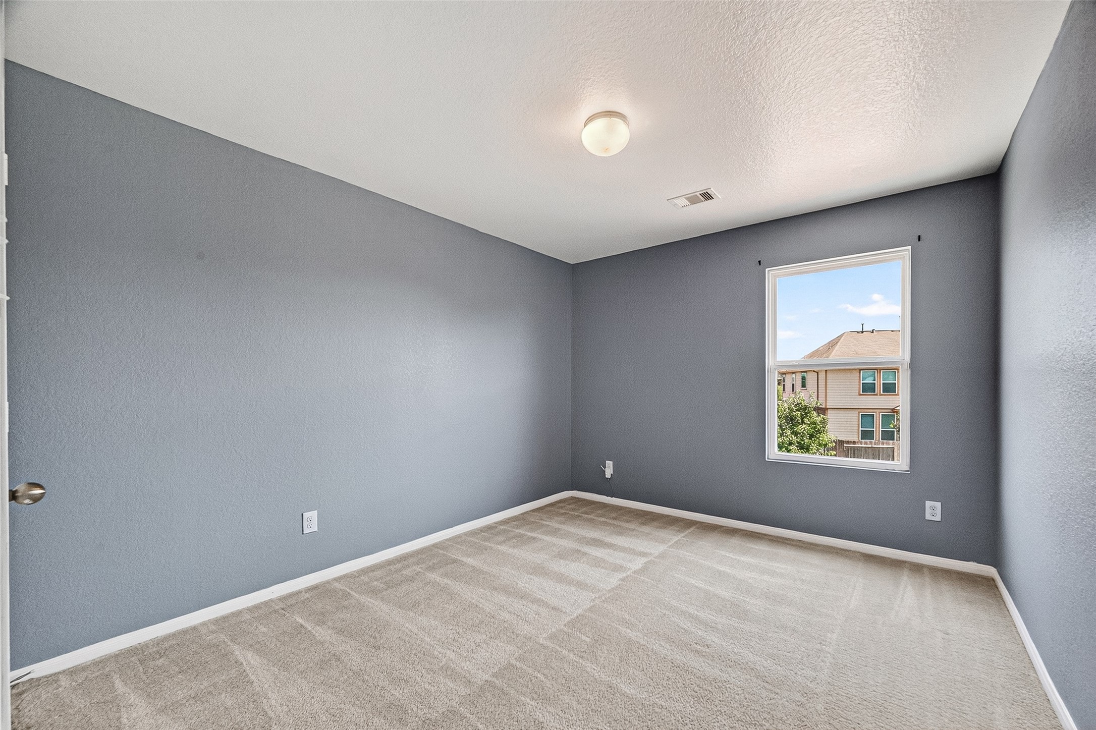 2702 Modano Court Fresno, TX 77545 - Photo 31 of 46 a view of an empty room with a window